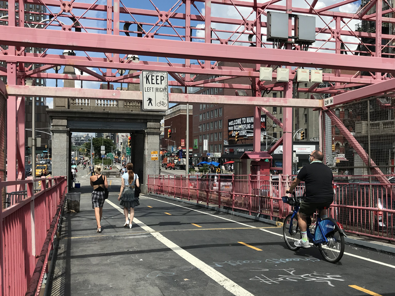 The Williamsburg Bridge's side by side bike and pedestrian spaces
